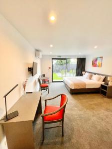 Tempat tidur dalam kamar di Carnmore Hagley Park