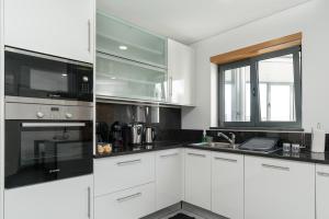 Η κουζίνα ή μικρή κουζίνα στο Luxurious Apartment Funchal - Casa Valentina - Rent2U, Lda