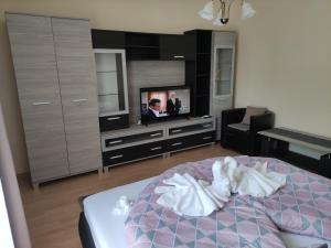 Postel nebo postele na pokoji v ubytování Zsanett Appartement