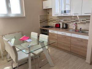 Una cocina o kitchenette en Center Piac Aparman