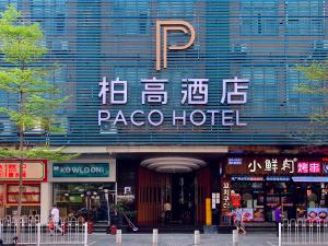 a large building with a sign for aaza hotel at Paco Hotel Tiyuxilu Metro Guangzhou-Free Shuttle Bus for Canton Fair in Guangzhou