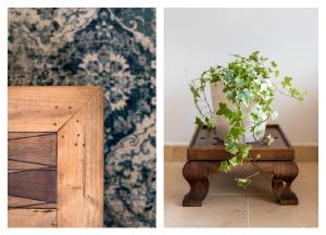 une table en bois avec une plante en pot au-dessus dans l'établissement Villa Boho, à Lagos