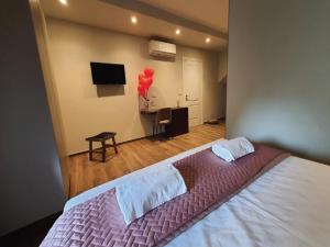 Katil atau katil-katil dalam bilik di Corte Trento - Exclusive Rooms