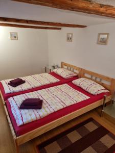 A bed or beds in a room at Ferienhaus Wernigerode "Am Schlossbühel" 5 Schlafzimmer