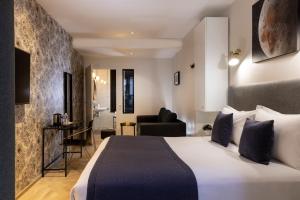 Hotel Brady - Gare de l'Est में एक कमरे में एक या कई बेड