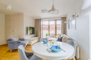 Гостиная зона в Apartamenty PIAMOLA Baltic Park Stegna