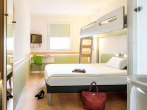 Uma cama ou camas num quarto em ibis budget Sao Paulo Paulista