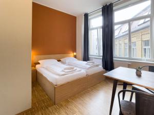 A bed or beds in a room at Five Elements Hostel Leipzig