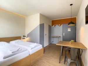 A bed or beds in a room at Five Elements Hostel Leipzig