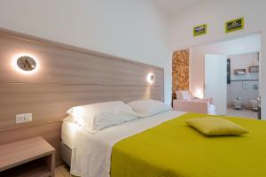 Posteľ alebo postele v izbe v ubytovaní Bardilio Luxury Rooms