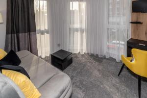 A seating area at Arany Apartman Miskolc