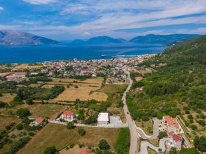 an aerial view of a town next to the water at Maria's Apartments in Sami