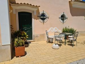 Un patio o zona al aire libre en Casa dos Ventos