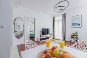 Sjónvarps- og/eða afþreyingartæki á Apartment Łobzowska Cracow by Noclegi Renters