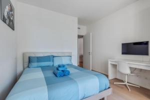 Postelja oz. postelje v sobi nastanitve Easylife - Modern and Spacious apt in Fiera City Life