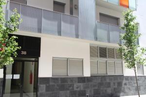 an external view of a building with balconies at Apartaments Centre Figueres in Figueres