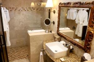 a bathroom with a sink and a mirror at Camino Real Antigua in Antigua Guatemala