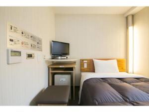 TV tai viihdekeskus majoituspaikassa R&B Hotel Umeda East - Vacation STAY 40693v