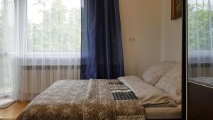 Kama o mga kama sa kuwarto sa Apartament Tarnów-Mościce PRZY MOŚCIE