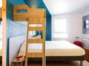 Krevet ili kreveti u jedinici u okviru objekta ibis budget Bordeaux Centre - Gare Saint Jean