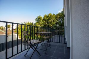 A balcony or terrace at Vilnius legends house I Best for families I Free parking