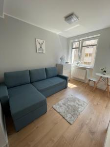 Chill Apartament Gdynia tesisinde bir oturma alanı