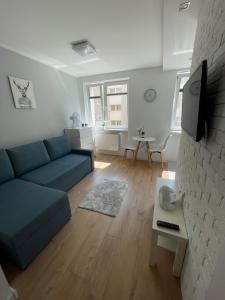 Chill Apartament Gdynia tesisinde bir televizyon ve/veya eğlence merkezi