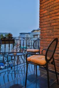 A balcony or terrace at Benelux Hotel