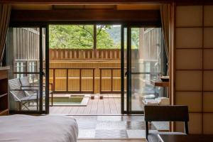 Kama o mga kama sa kuwarto sa Hakone Kowakien Mikawaya Ryokan