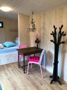 A bed or beds in a room at Camping Het Vossenhol