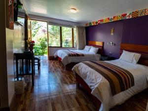 Hotel Tierra Inka Sacred Valley 객실 침대