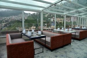 אזור ישיבה ב-The Orchid Hotel Shimla