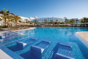 The swimming pool at or close to Hotel Riu Palace Maspalomas - Adults Only