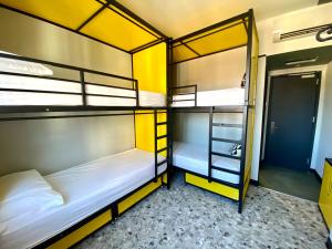 Una cama o camas en una habitación de YellowSquare Milan