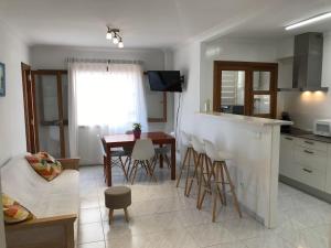 Kuchyň nebo kuchyňský kout v ubytování Apartament Cel de Mar