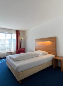 Lova arba lovos apgyvendinimo įstaigoje City Hotel Fortuna Reutlingen