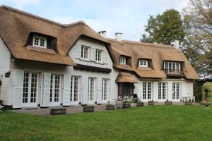 Um jardim em Villa Monceau Louvain la neuve