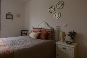 Кровать или кровати в номере Avenida Central - Coimbra Accommodation