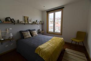 Кровать или кровати в номере Avenida Central - Coimbra Accommodation