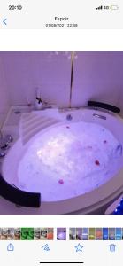 a picture of a bath tub in a bathroom at Nid d'amour baignoire/jacuzzi in Nice