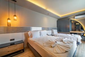 Tempat tidur dalam kamar di S3 Seahorse Beach Club