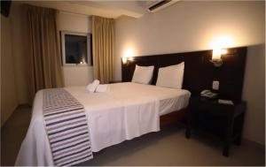 Hotel Boulevard Plaza में एक कमरे में एक या कई बेड