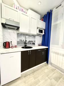 Dapur atau dapur kecil di Apartment Studio LONDON 92