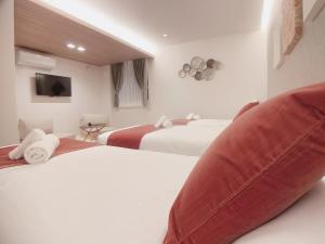 Cama ou camas em um quarto em HOTEL CLA-SS HIROSHIMA-TOKAICHI