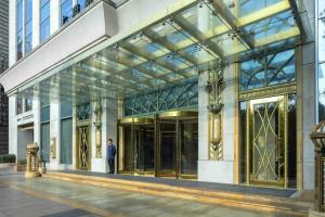 The facade or entrance of Radisson Blu Hotel Shanghai New World