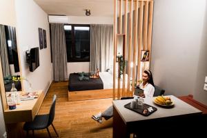 Uma área de estar em Glam Boutique Apartments - Thessaloniki Heart