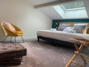 A bed or beds in a room at Chalet Pleine Vue & Spa