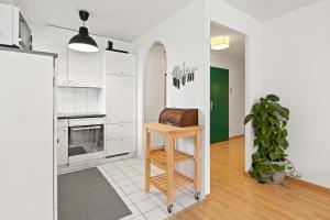 Una cocina o kitchenette en Bright, Central & Modern apartment