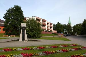 A garden outside Hotel Dobele