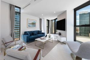 Posezení v ubytování Meriton Suites Sussex Street, Sydney